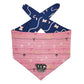 Pink and blue patterned bandana with a visible brand logo on a white background